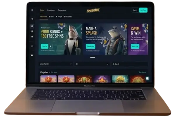 Laptop displaying Spinshark Casino interface for playing Shark Spin slots in the UK